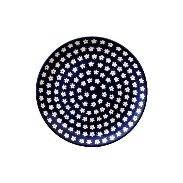 Polish Pottery dinner plate 10" with navy surface with small white flowers and red centers, Ceramika Artystyczna, 247X
